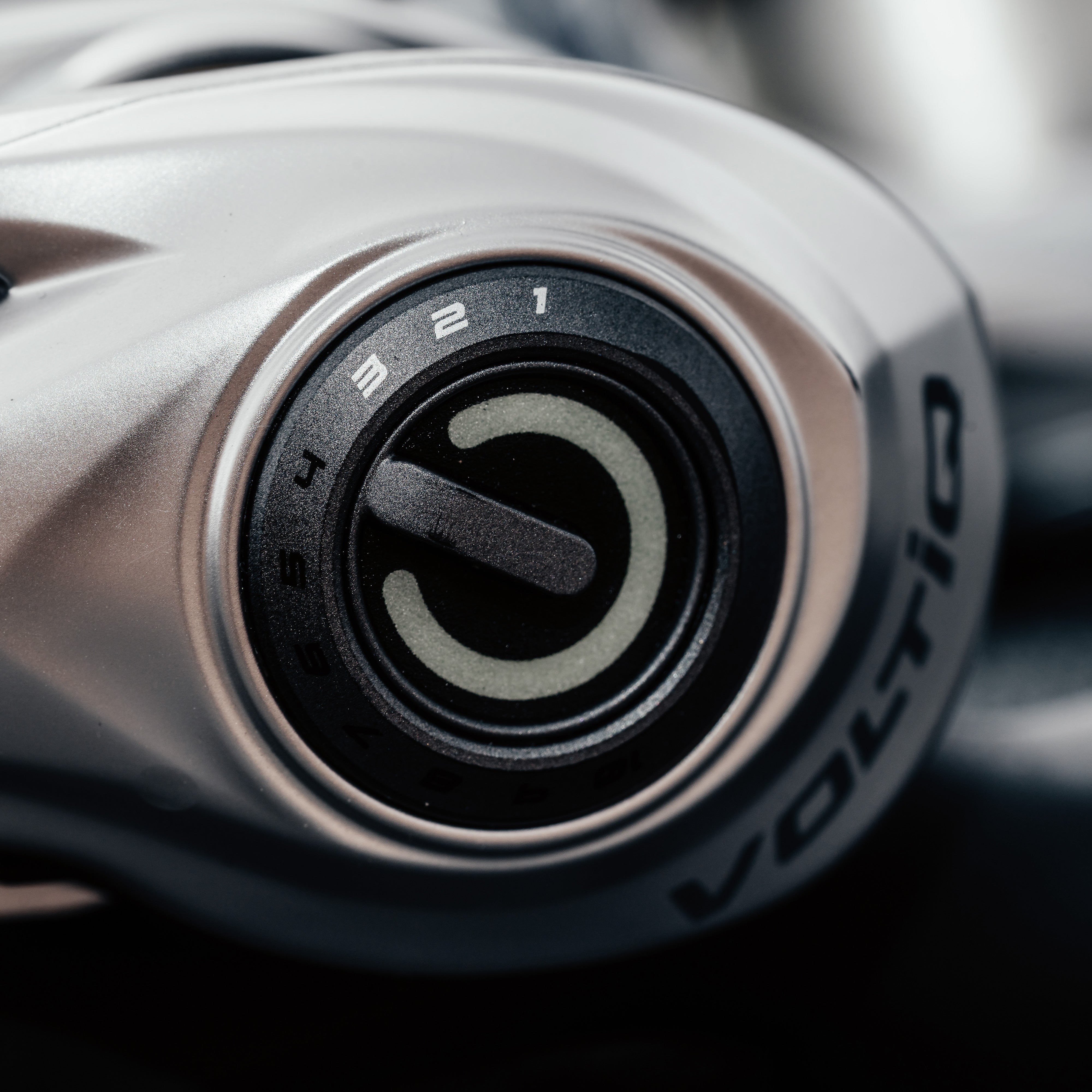 Close-up of a Revo® VoltiQ™ Low Profile Reel with a blurred background